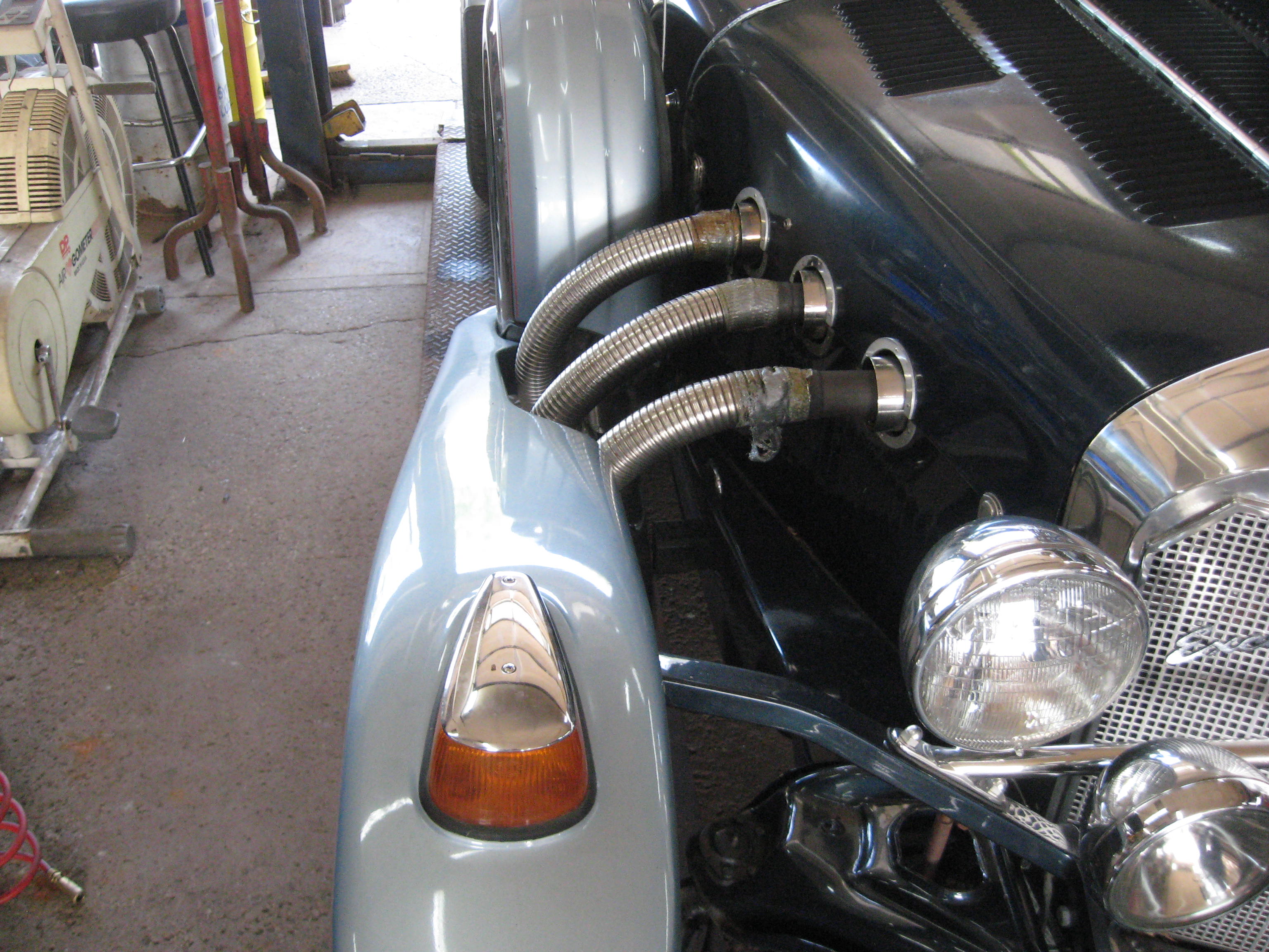 Automotive Exhaust Specialists work